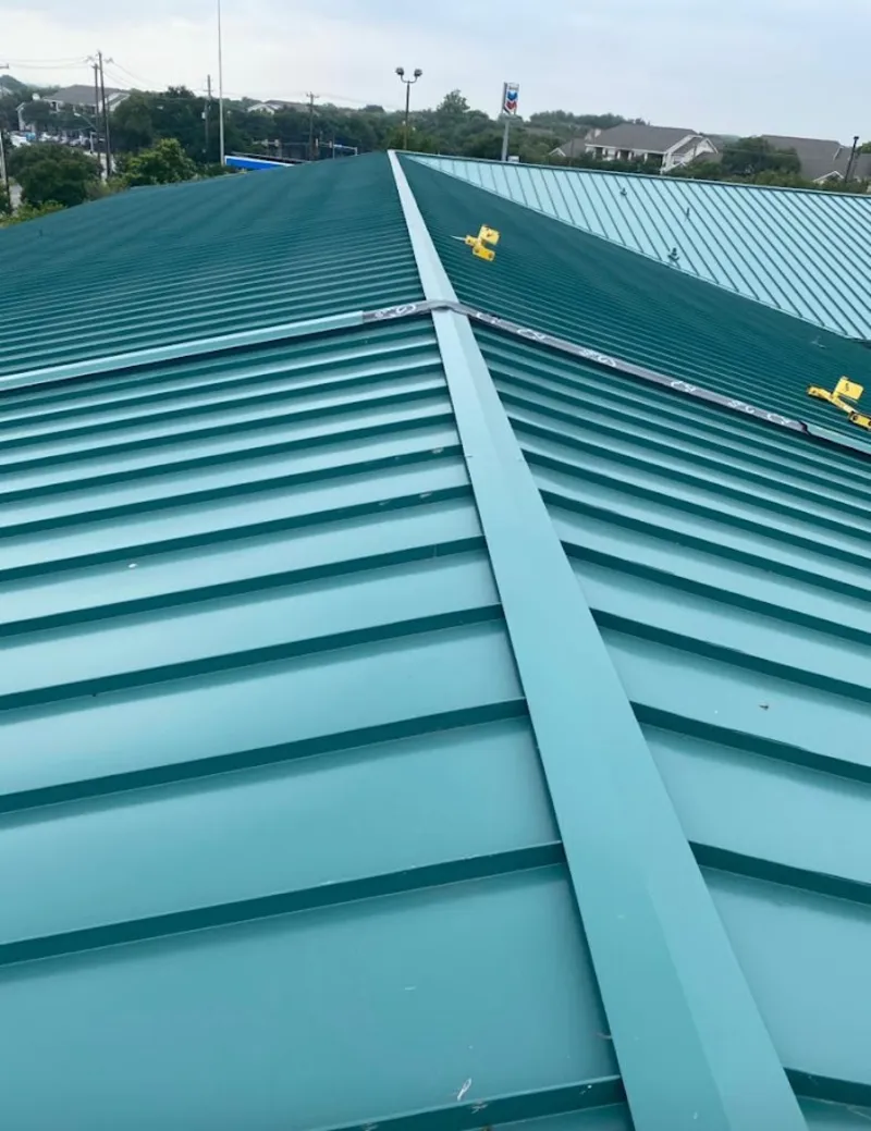 Green commercial metal roof ridge and valley for Metal Roof Repair in Glendale
